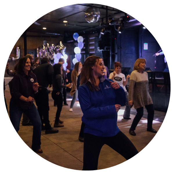 Photo of Alumni Dancing at Homecoming Photo of Alumni Dancing at Homecoming